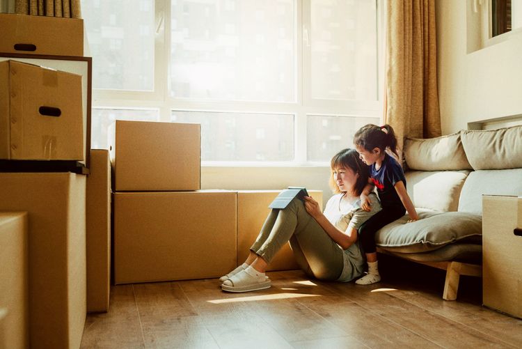 A woman and her daughter planning their move